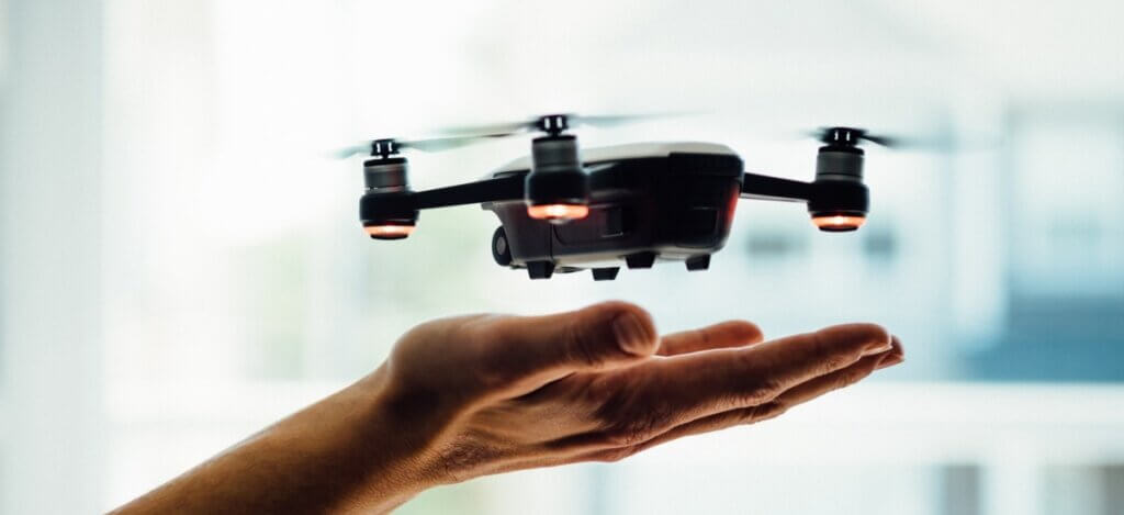 Howard Wiener - Banner - Small drone flying on a hand
